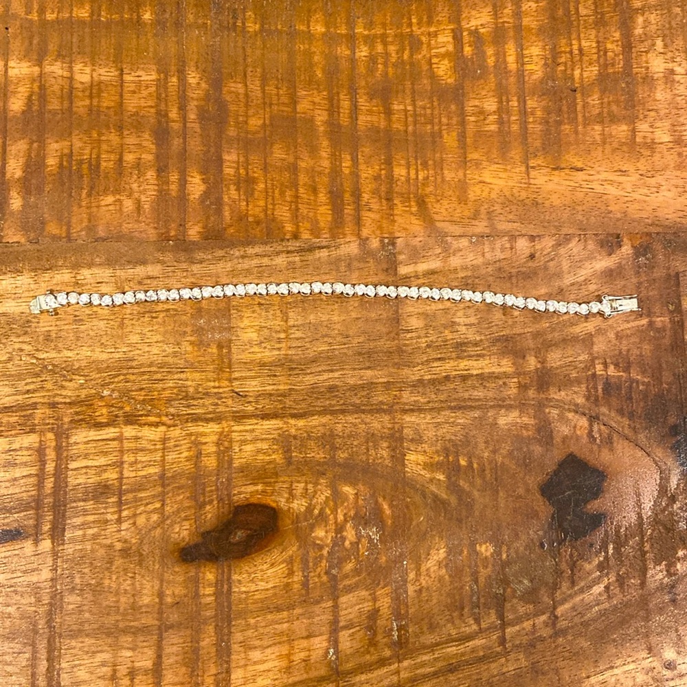 Silver plated bracelet with white gemstones